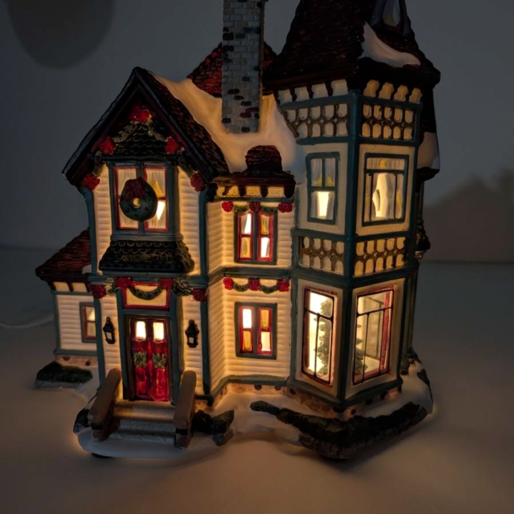 Festive Illuminated Holiday Village House